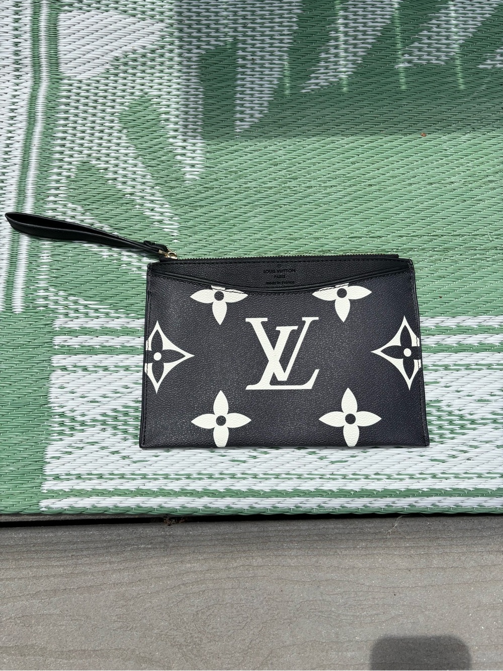 Not a Louis Vuitton. Black Exterior with Tan Suede Interior Pouch Wristlet
